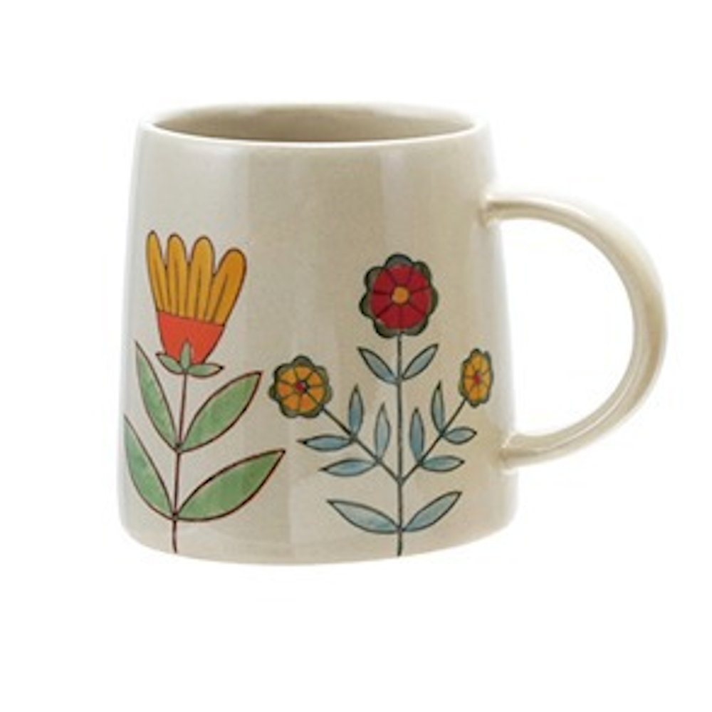 Cream stoneware mug featuring hand-painted retro floral illustrations in warm orange, red, and yellow earth tones.