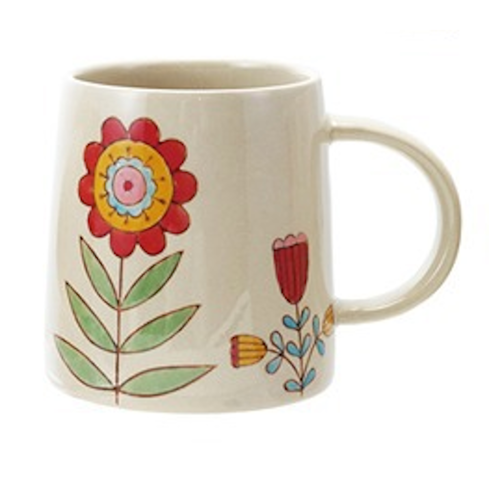 Hand-painted floral stoneware mug featuring a vibrant red flower and folk-art botanical designs on cream ceramic.