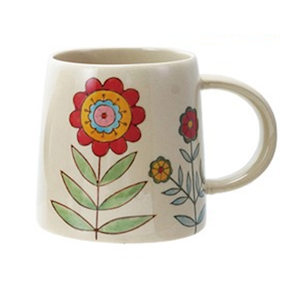 Hand-painted floral stoneware mug featuring a vibrant red folk-art flower design on a cream ceramic background.