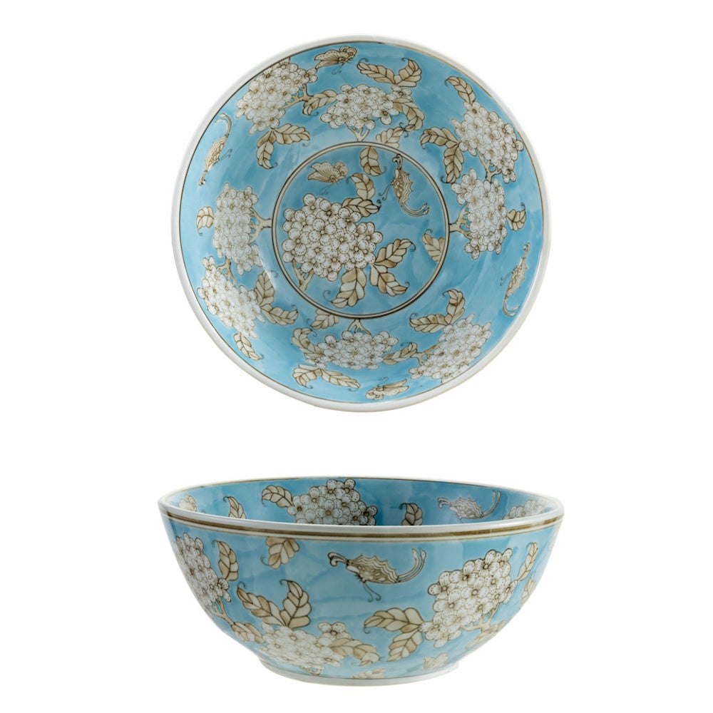 Blue stoneware serving bowl with white cherry blossom and butterfly patterns, featuring a light blue interior and exterior.