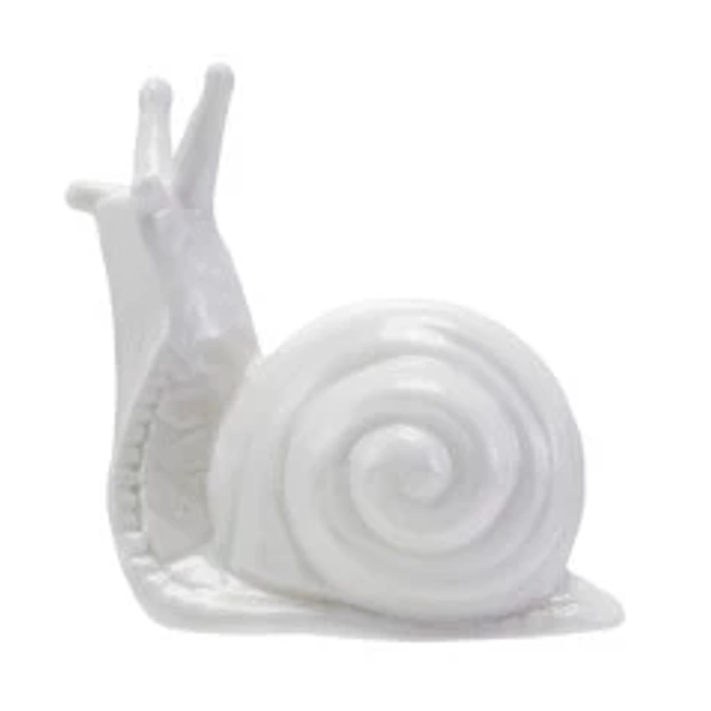 A simple white glazed ceramic snail figurine against a plain white background.