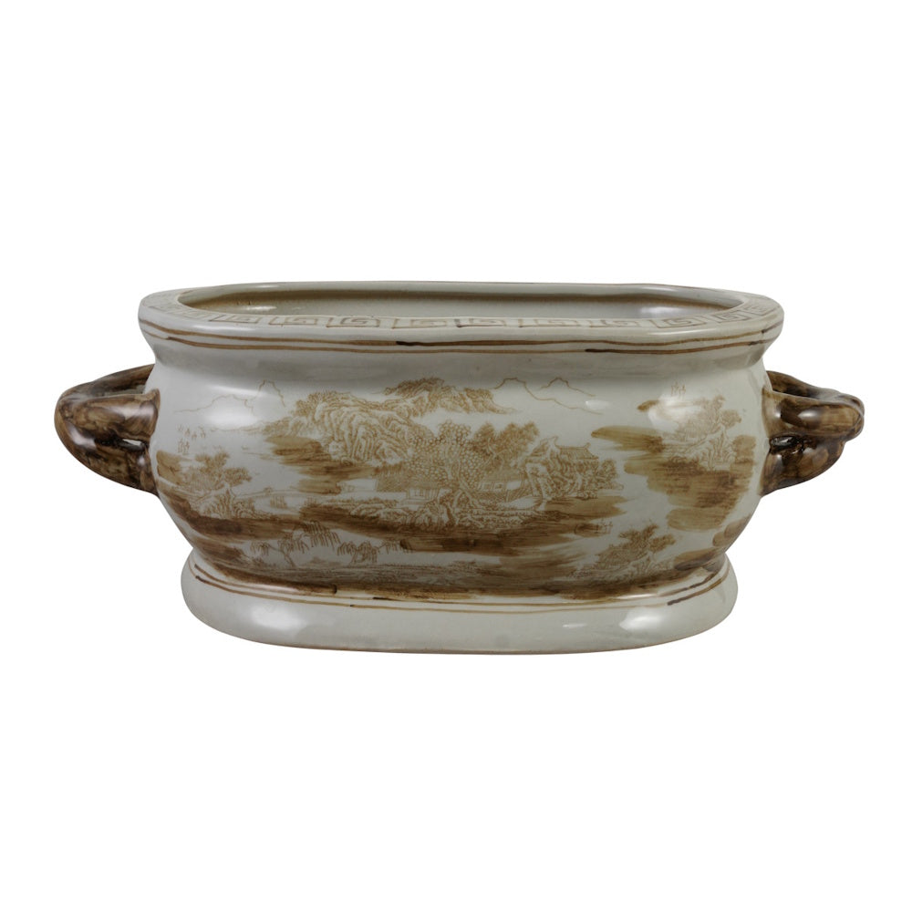 An oval stoneware planter with handles, decorated with a sepia-toned vintage landscape illustration.