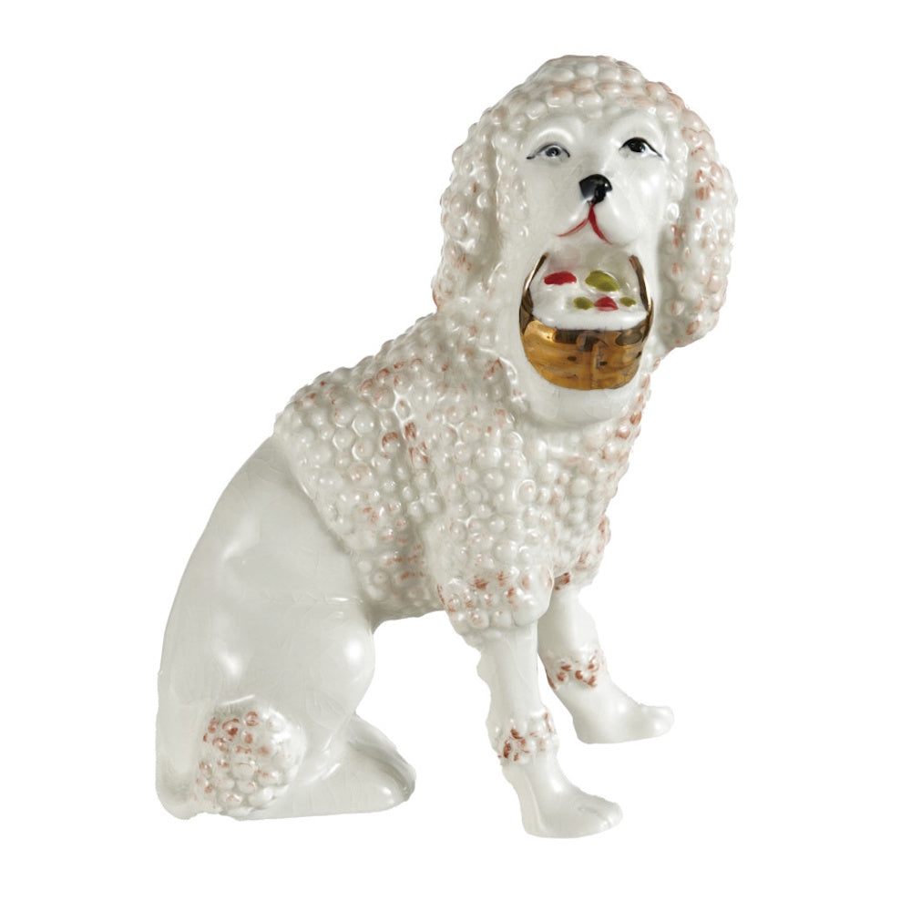 Vintage reproduction white Staffordshire poodle figurine holding a flower basket on white background.