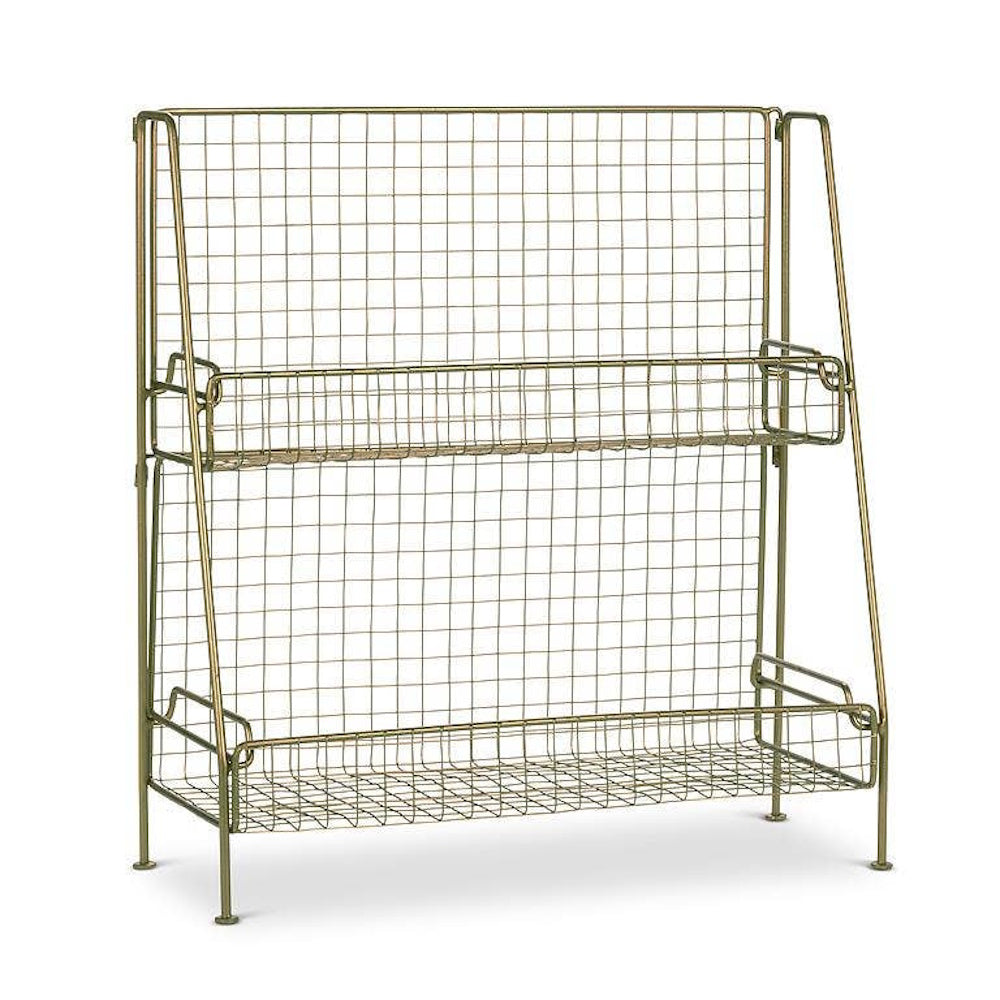Two-tier gold wire storage rack with mesh baskets and a grid back against a white background.