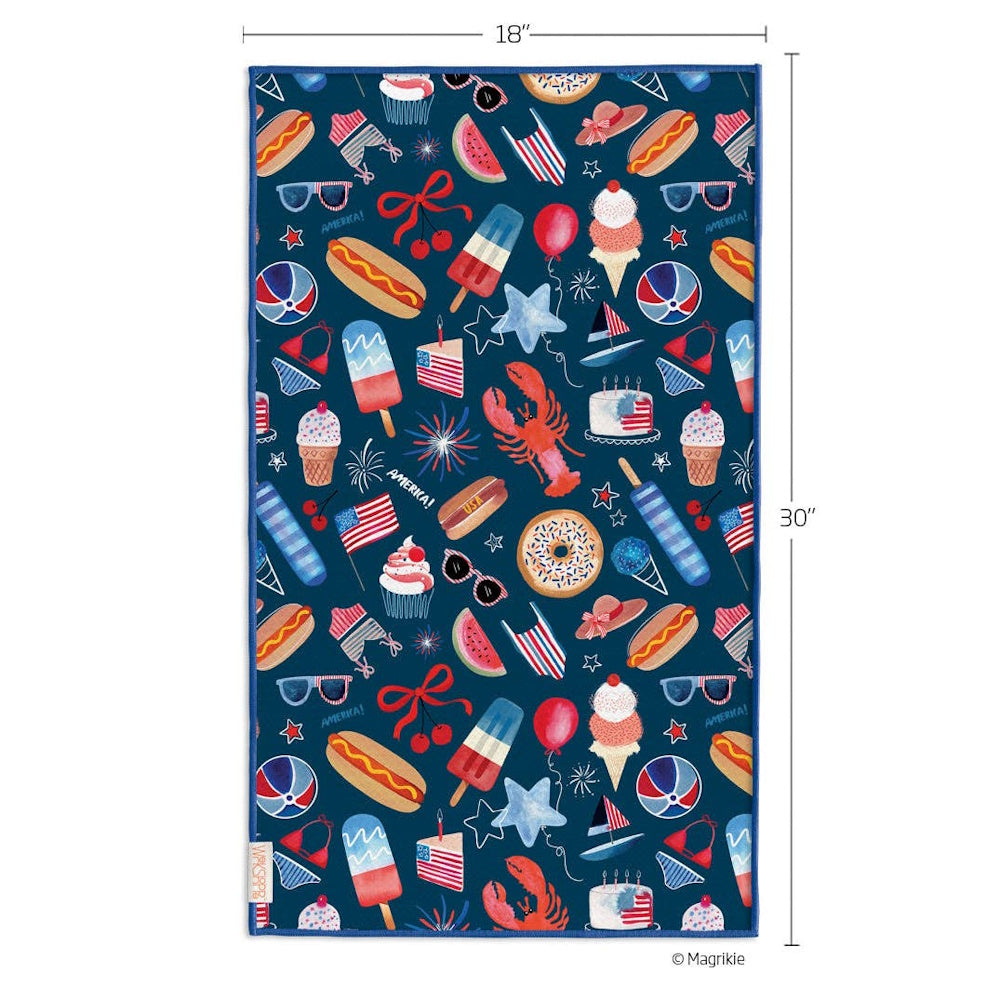 A 30 by 18 inch navy kitchen towel featuring a summer pattern of hot dogs, ice cream, lobsters, and American flags.