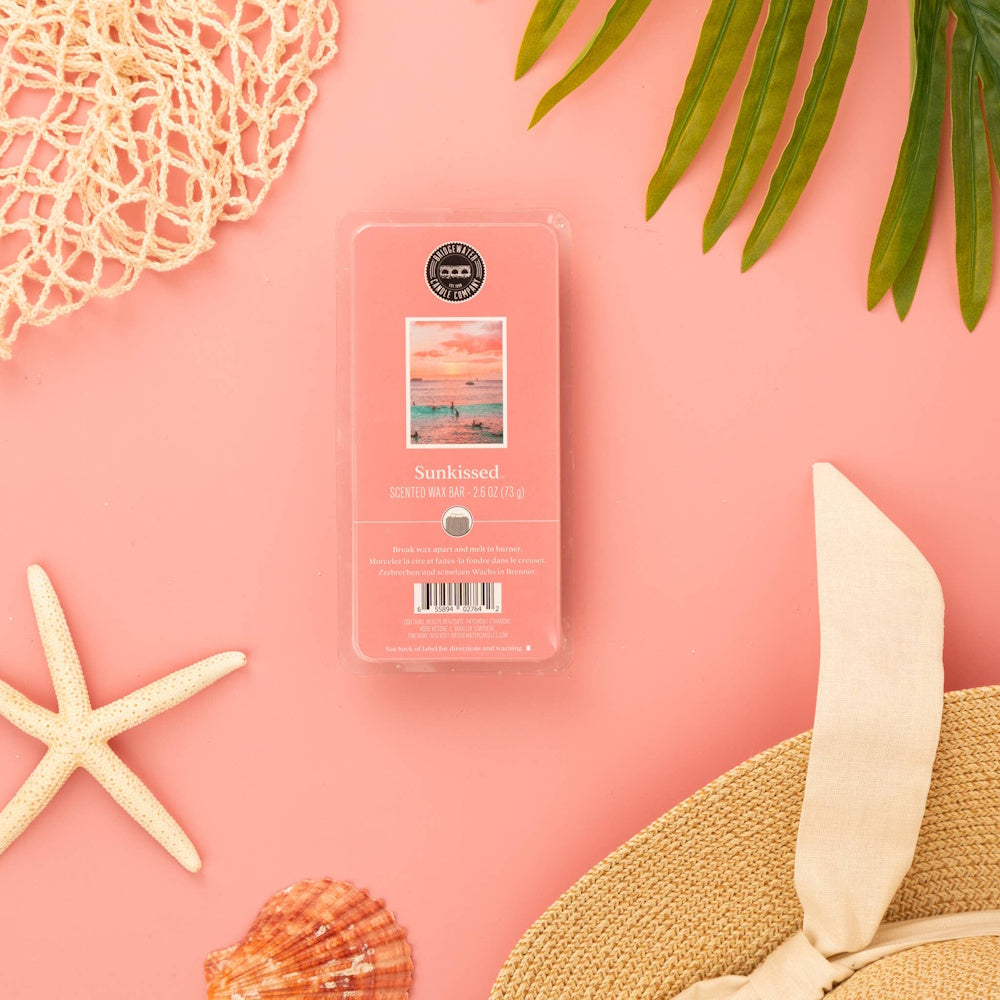 Bridgewater Sunkissed Scented Wax Bar on pink background with starfish, seashells, and beach hat for summer home fragrance.