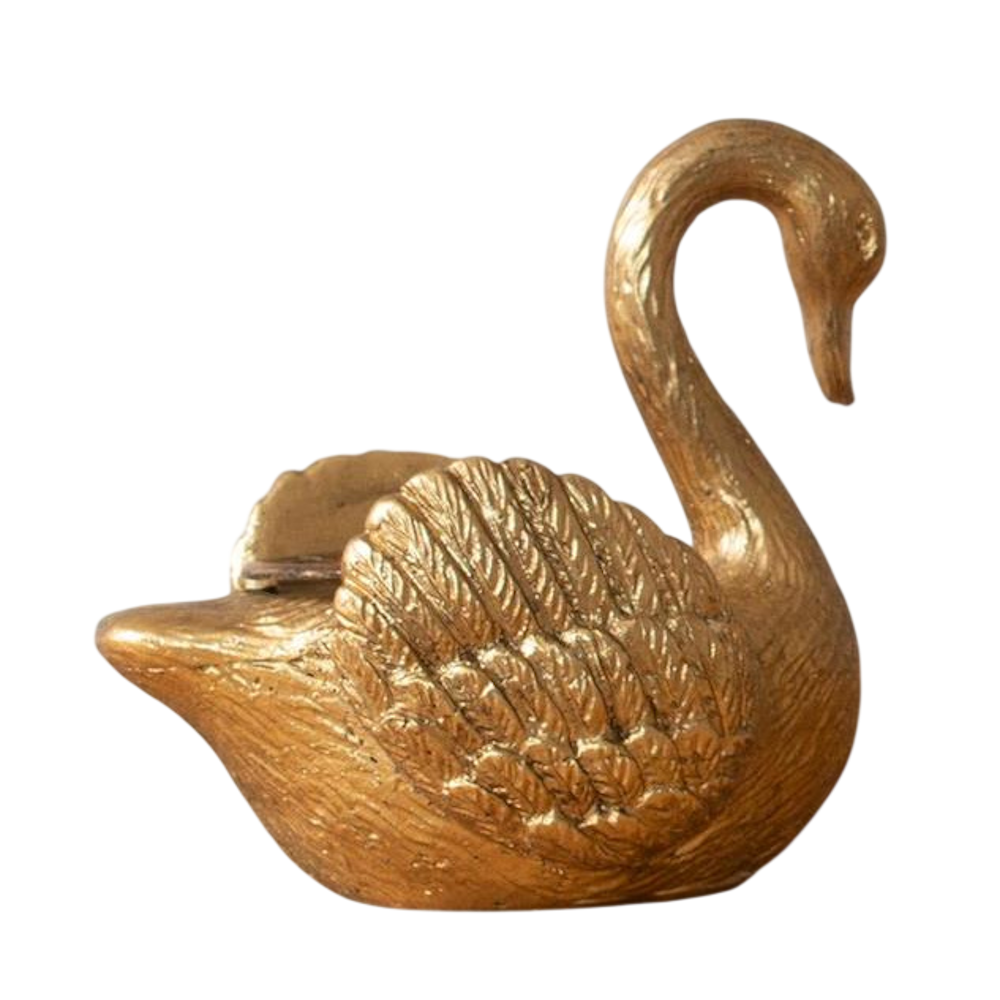 Gold swan-shaped tapered candle holder with textured wings and an elegant arched neck on a white background.