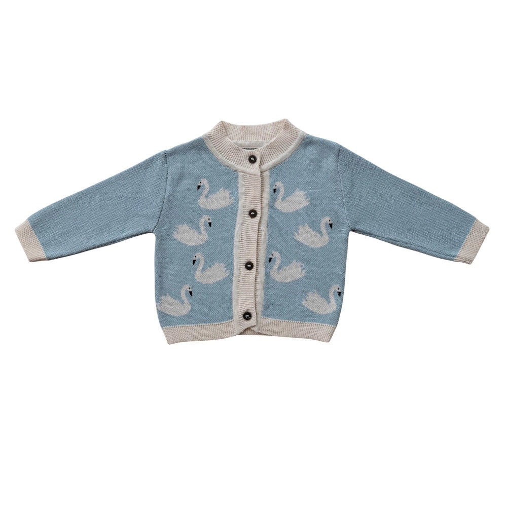 Light blue cotton knit baby cardigan sweater with white swan pattern and brown wood buttons.