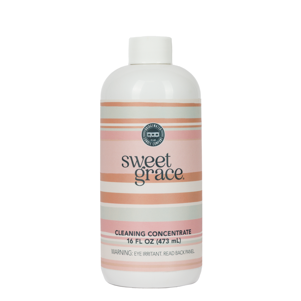 Bridgewater Candle Company Sweet Grace cleaning concentrate 16 fl oz bottle with pink and orange stripes.