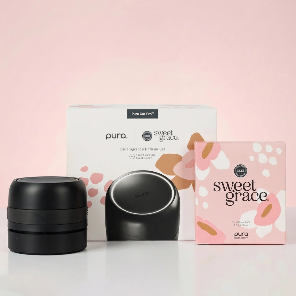 Pura Car Pro diffuser set featuring a black car fragrance device, product box, and refill package.