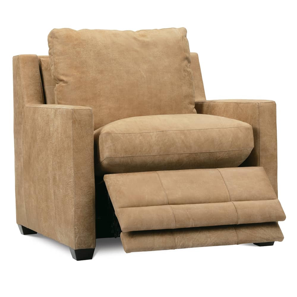 Modern tan leather recliner chair with plush cushions and extended footrest for living room comfort.