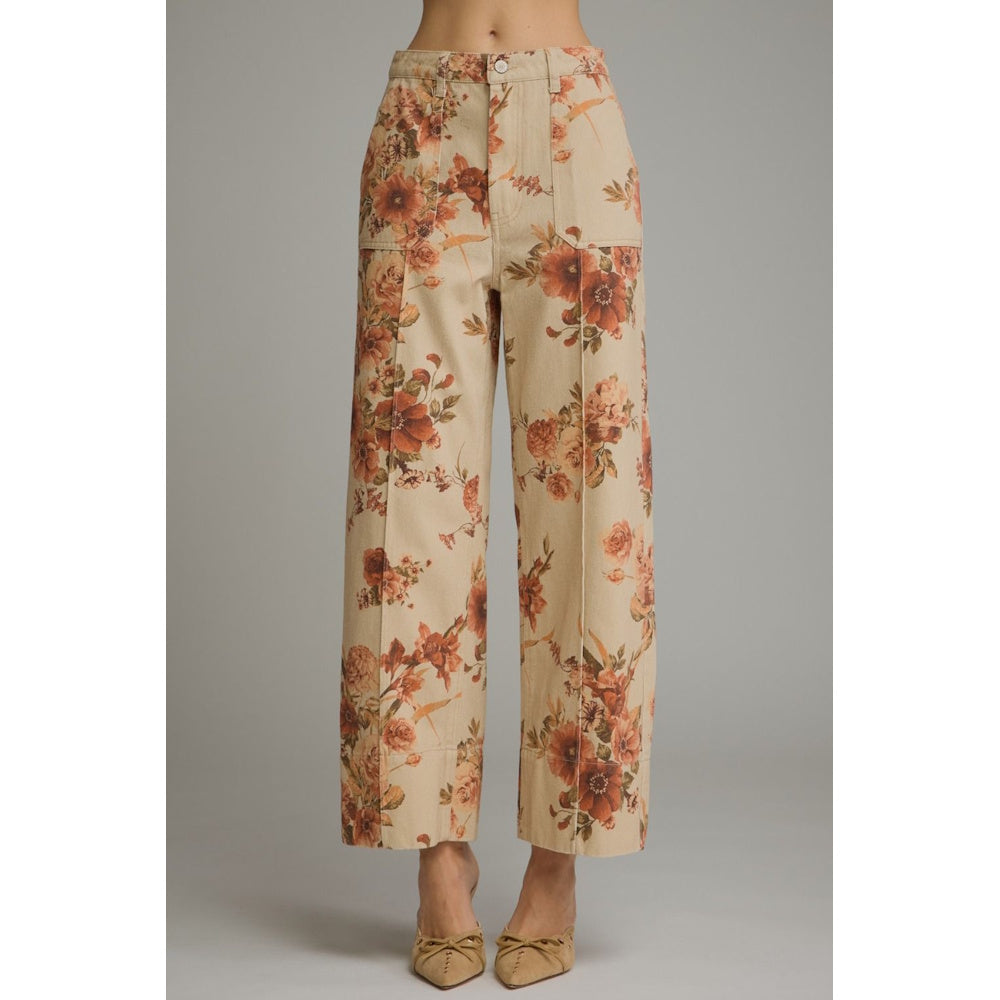 Full front view of taupe wide-leg pants with a warm brown floral print and front patch pockets.
