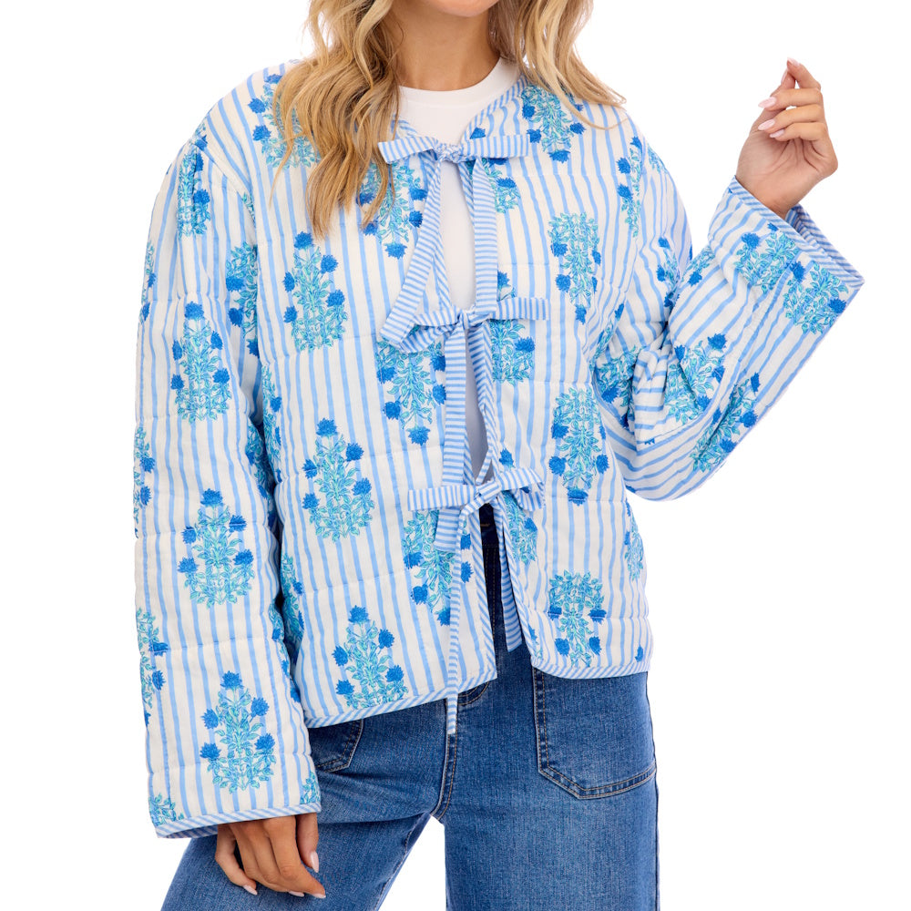 Blue and white striped quilted jacket with floral block print and front ribbon tie closures.