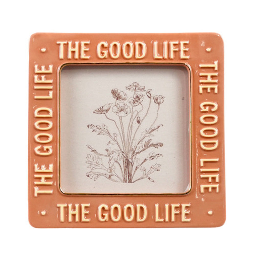 Terracotta square picture frame embossed with "THE GOOD LIFE" on all sides, featuring a sketch of flowers.