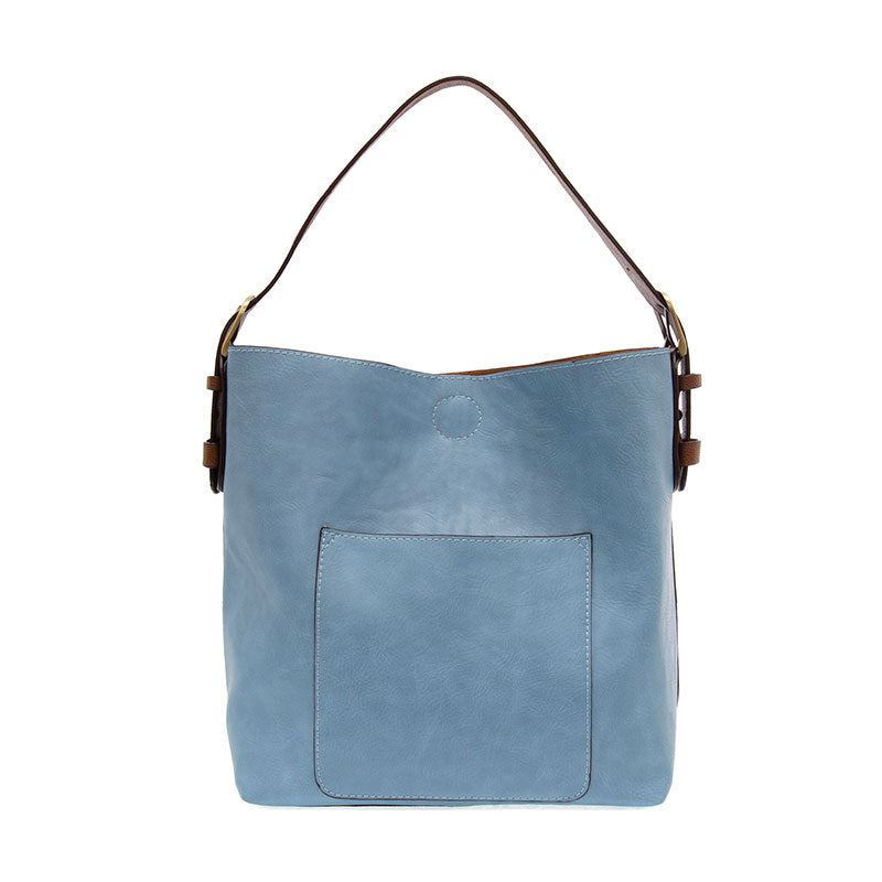 Tranquil blue hobo handbag with a brown coffee-colored handle and front pocket on a white background.