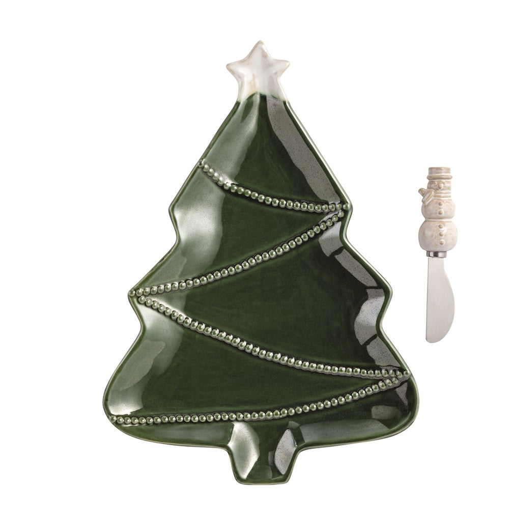 Green Christmas tree-shaped platter with beaded garland detail and a snowman-handled spreader knife.