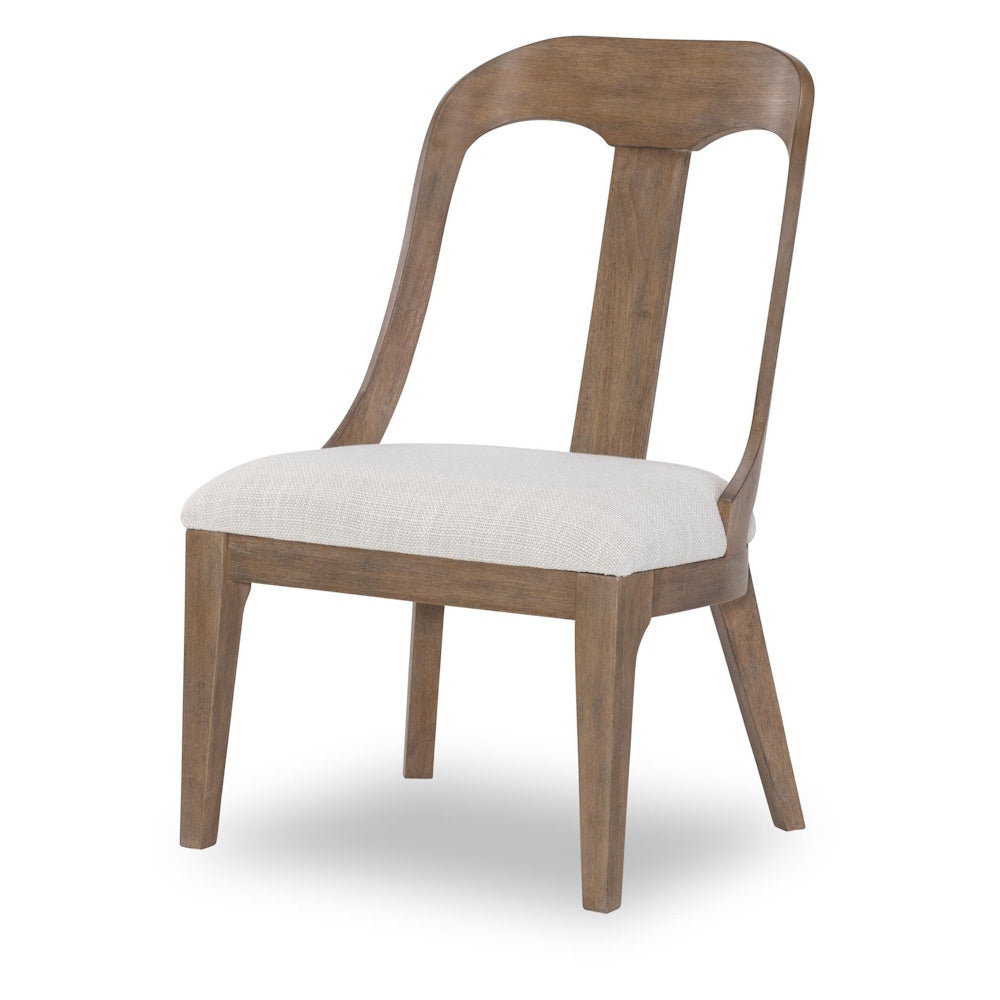 Rustic wood dining chair with curved back and cream upholstered seat cushion.