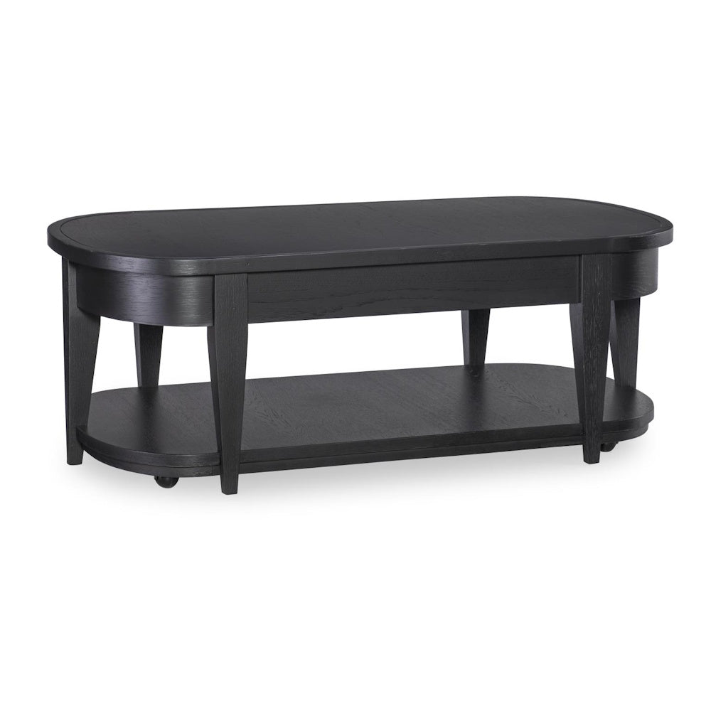 Oval black wooden cocktail table with an open lower shelf and tapered legs against a white background.