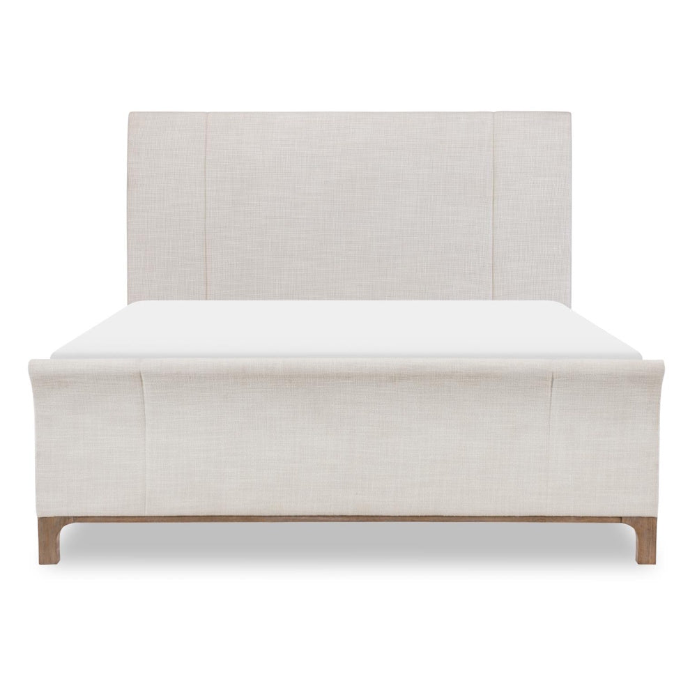 Modern beige upholstered sleigh bed frame with a high headboard and wooden legs.