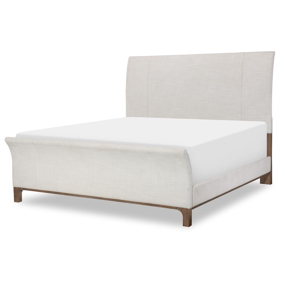 Modern beige upholstered sleigh bed frame with wooden legs and high headboard.