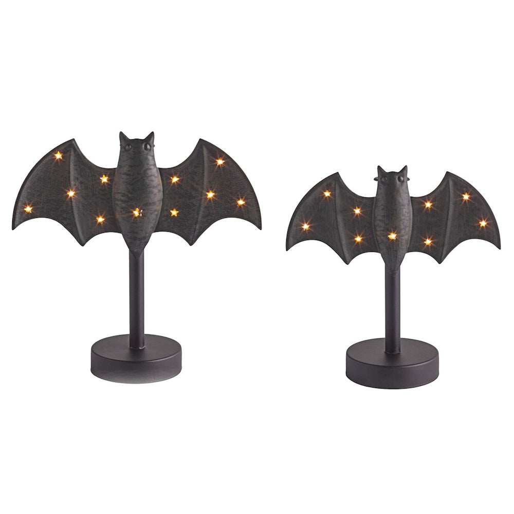 Pair of lighted black bat Halloween candlesticks with star lights.
