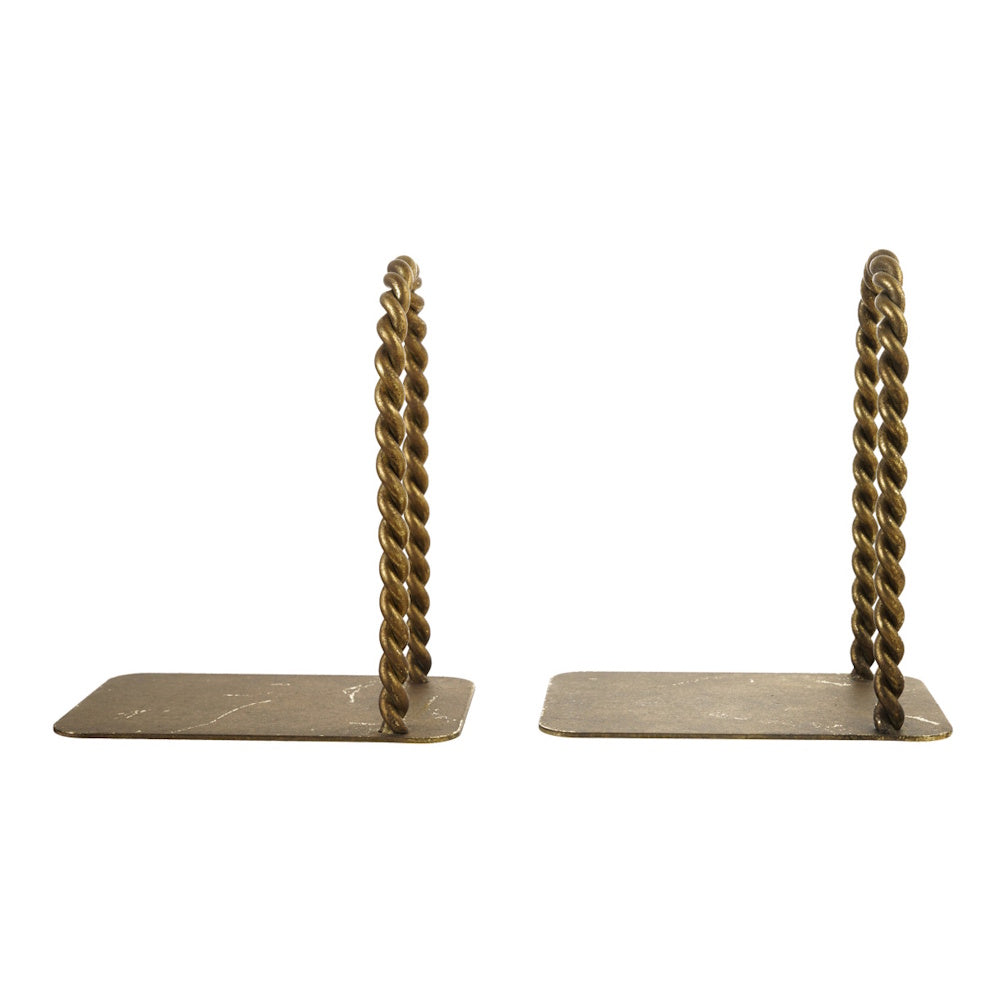A pair of brass-finished bookends, each featuring a flat metal base and a tall, twisted metal arch.