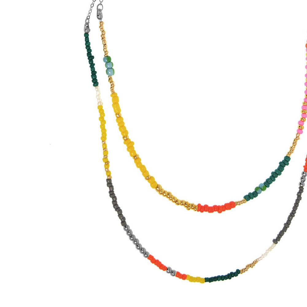 Two-row layered necklace featuring multi-colored beads in yellow, green, and red with gold-toned accents.