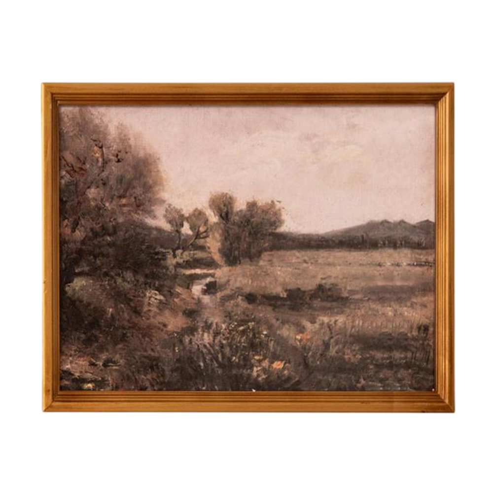 Vintage landscape oil painting of a countryside field in an antique gold frame, featuring muted earth tones.