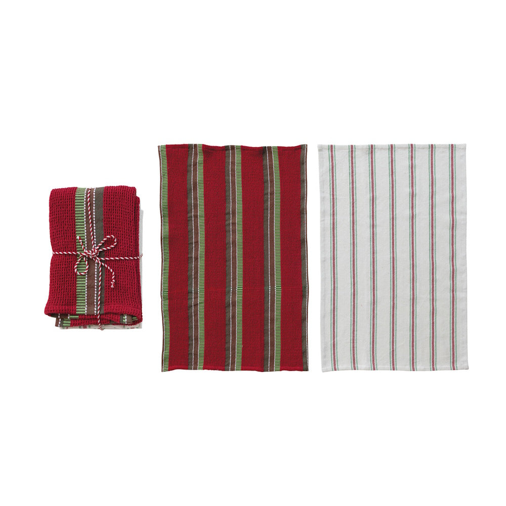 Set of striped waffle-weave tea towels in red, green, and white on a plain white background.