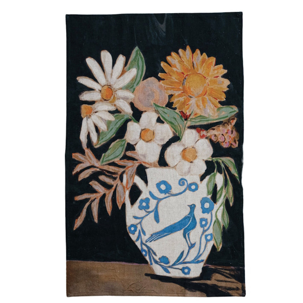 Floral painting of a white vase with blue bird detail and assorted flowers on a dark background.