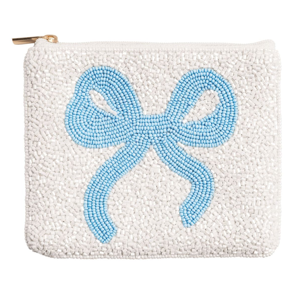 White beaded pouch with a blue beaded bow design and gold zipper on a white background.