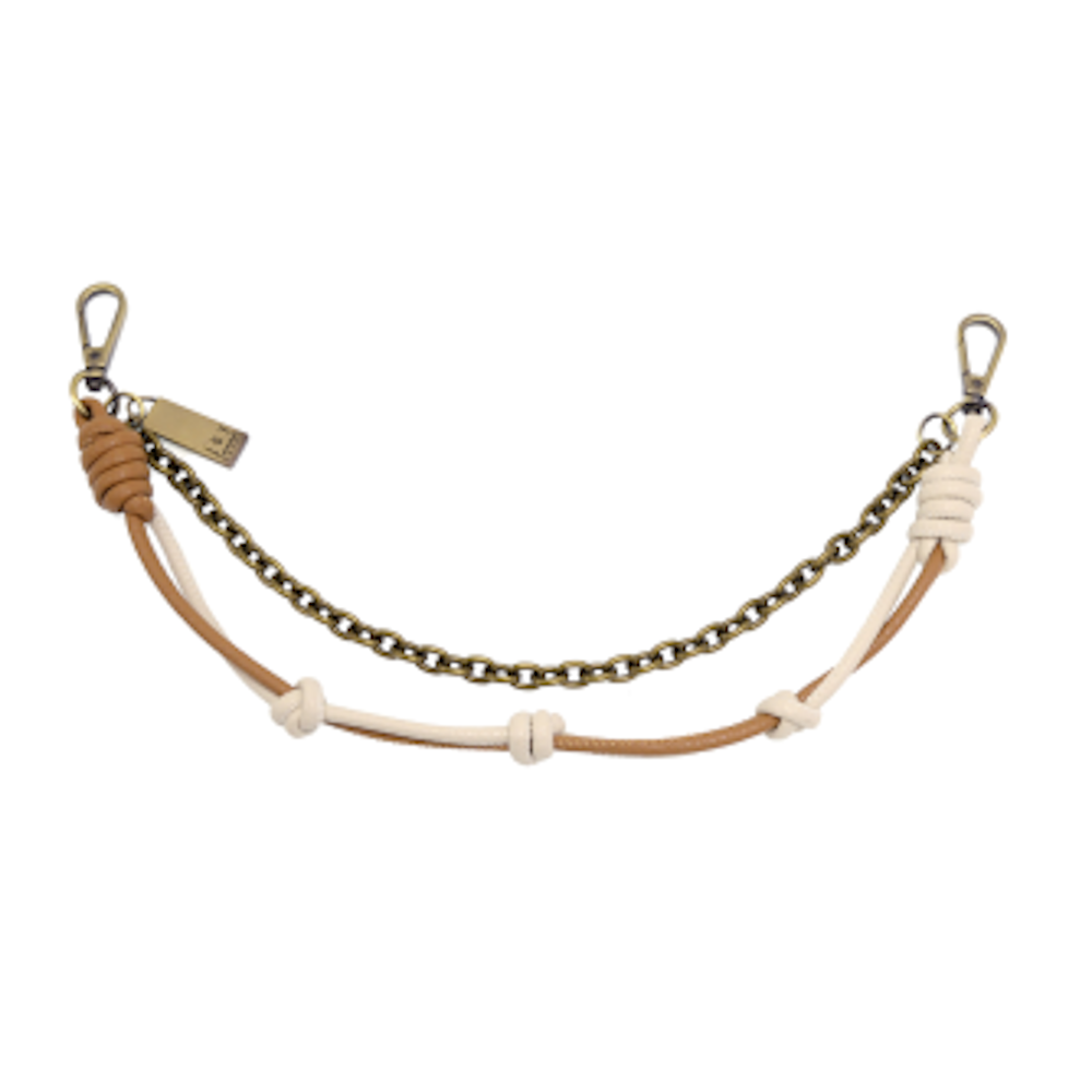 Two-row bag chain with white and camel knotted leather cords and an antique brass chain with swivel lobster clasps.