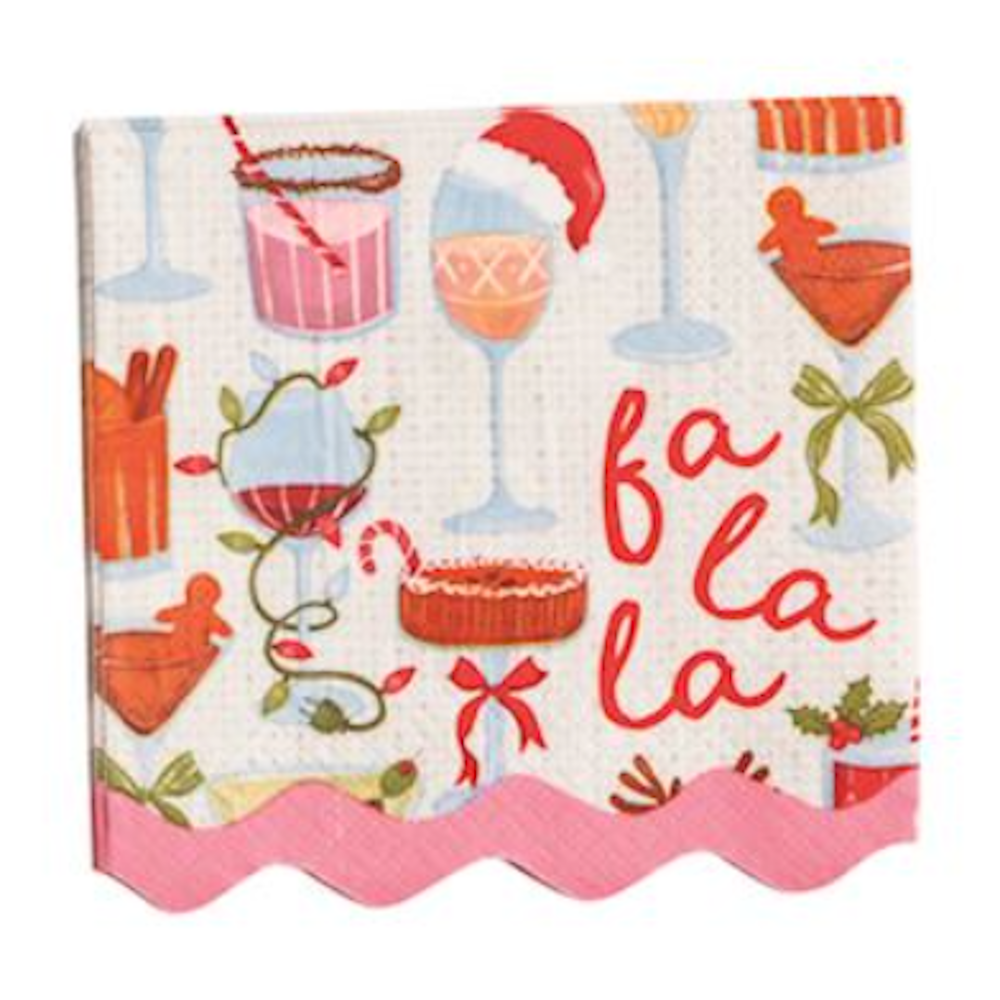 White napkin reading "fa la la" surrounded by a print pattern of festive holiday cocktails.