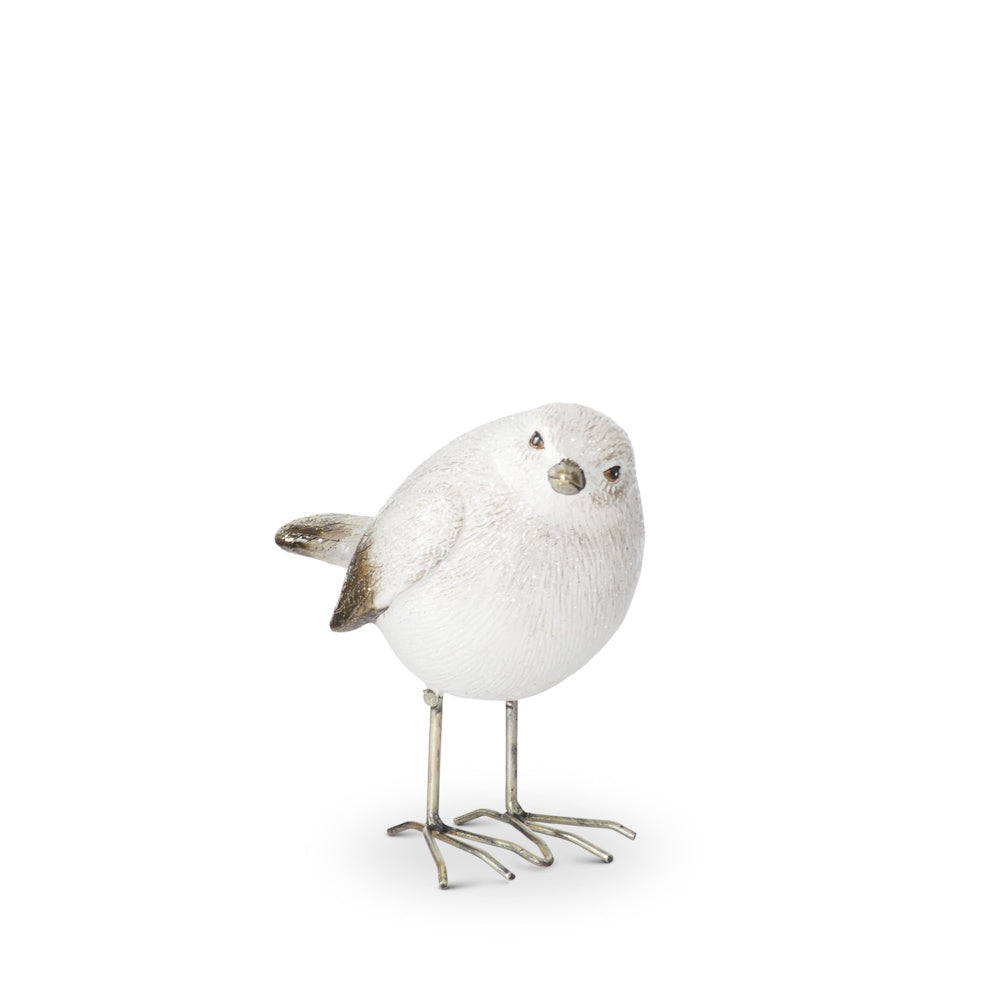 White and gold glittered bird figurine facing forward, standing on thin metal legs against white.