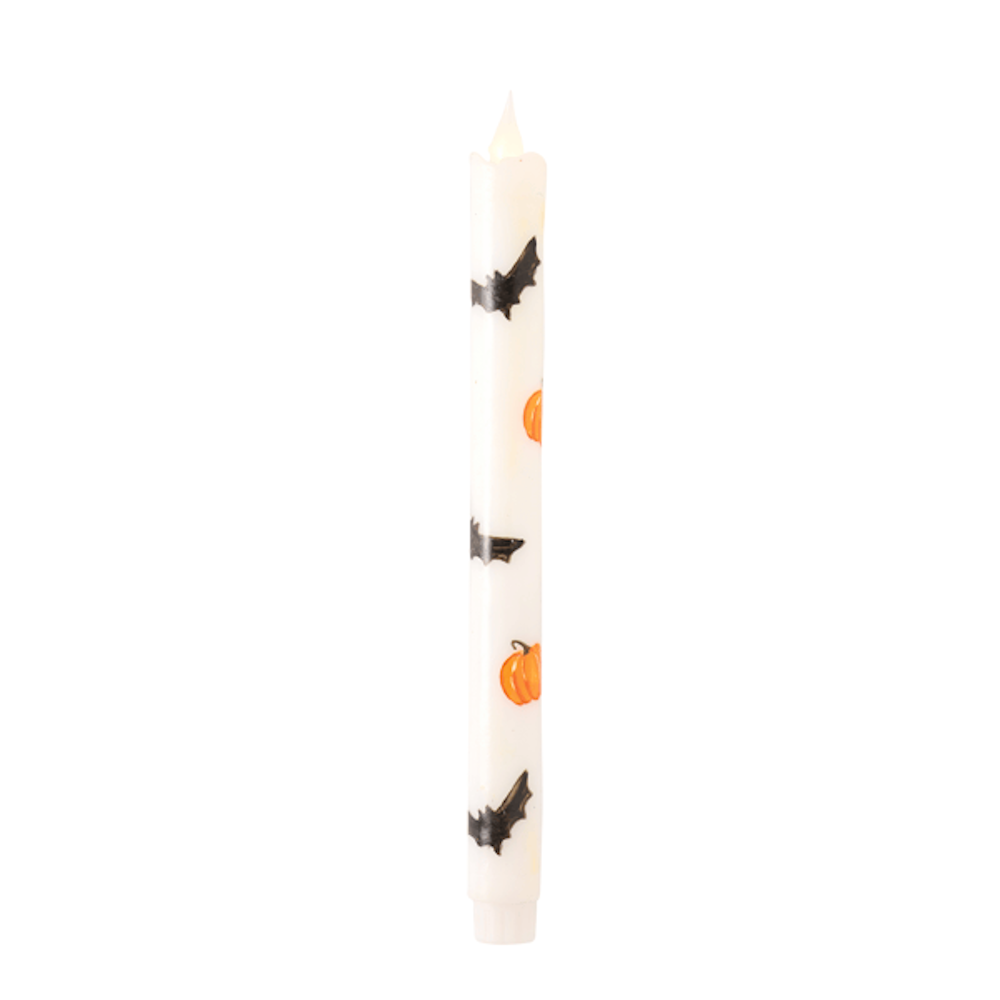 White LED taper candle with bats and pumpkins for festive Halloween tabletop decor.