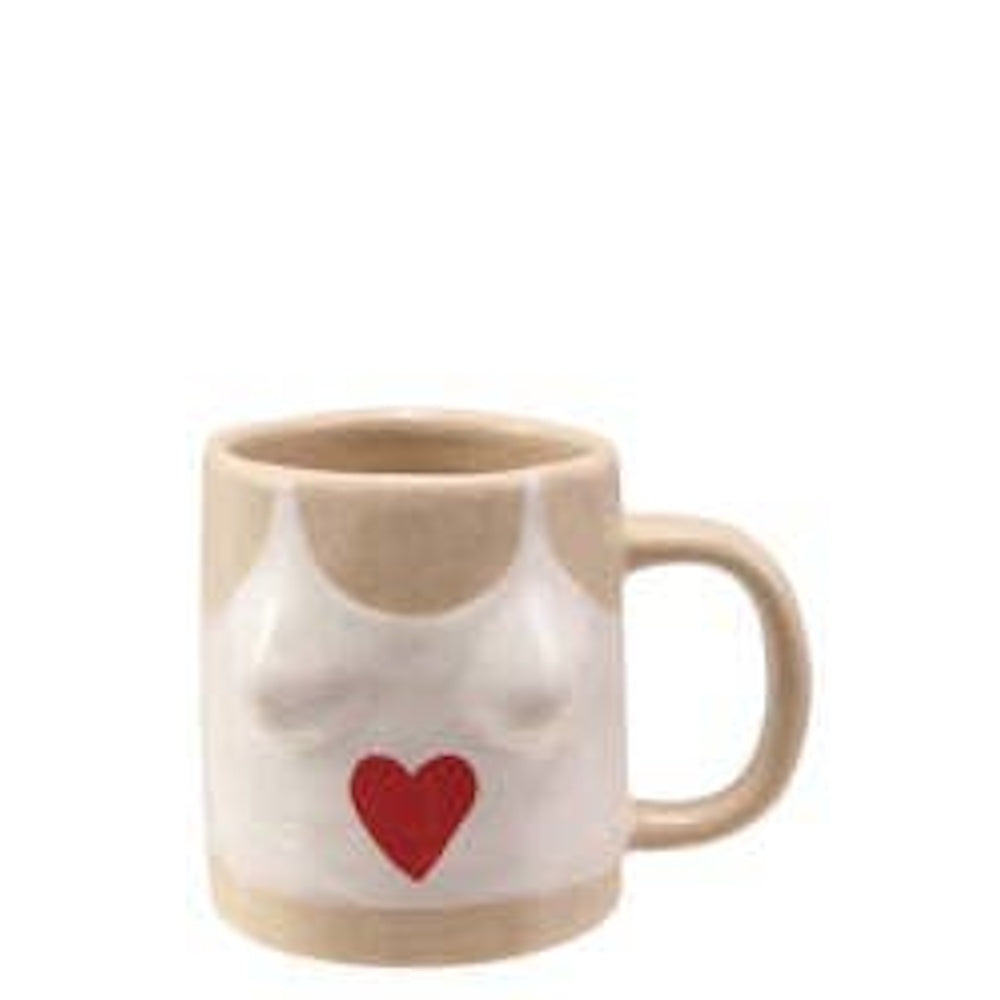 Cream ceramic mug sculpted like a bikini top with a painted red heart on the front.