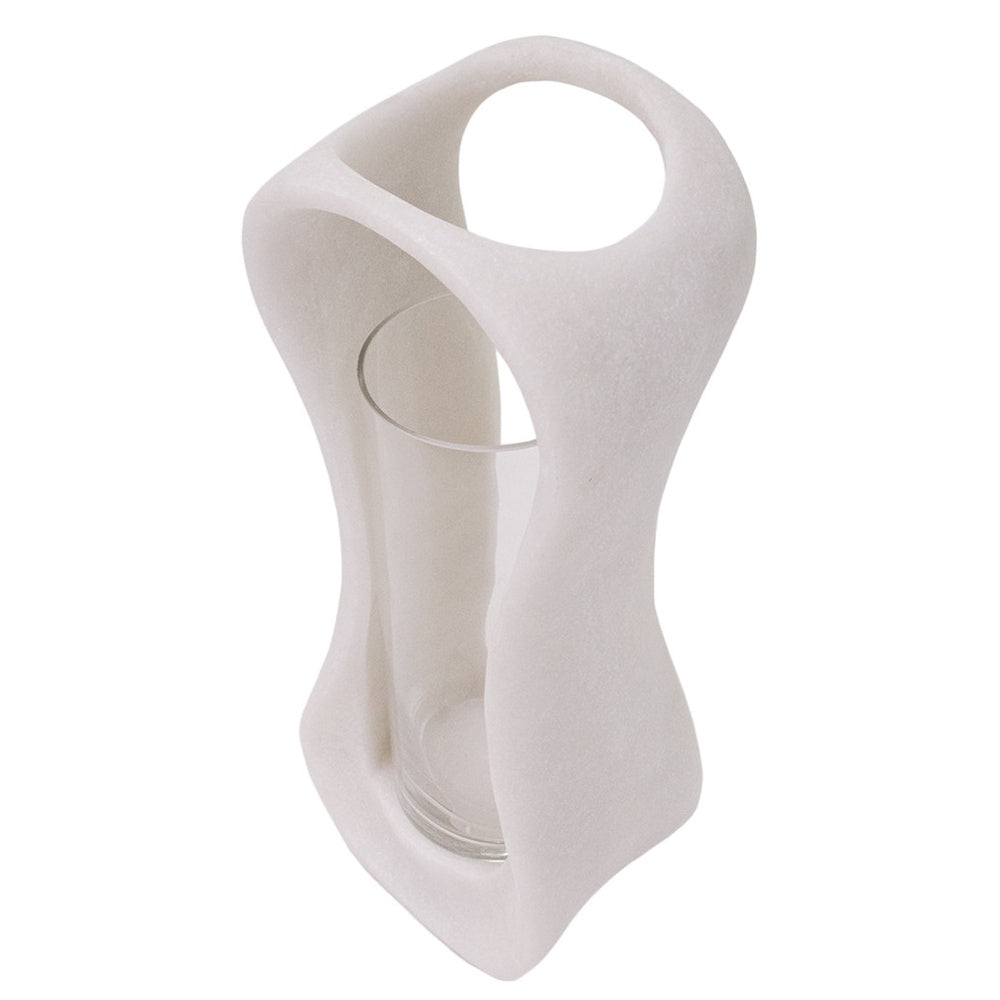 Modern white marble hurricane candle holder with an organic, sculpted silhouette and a clear glass insert.