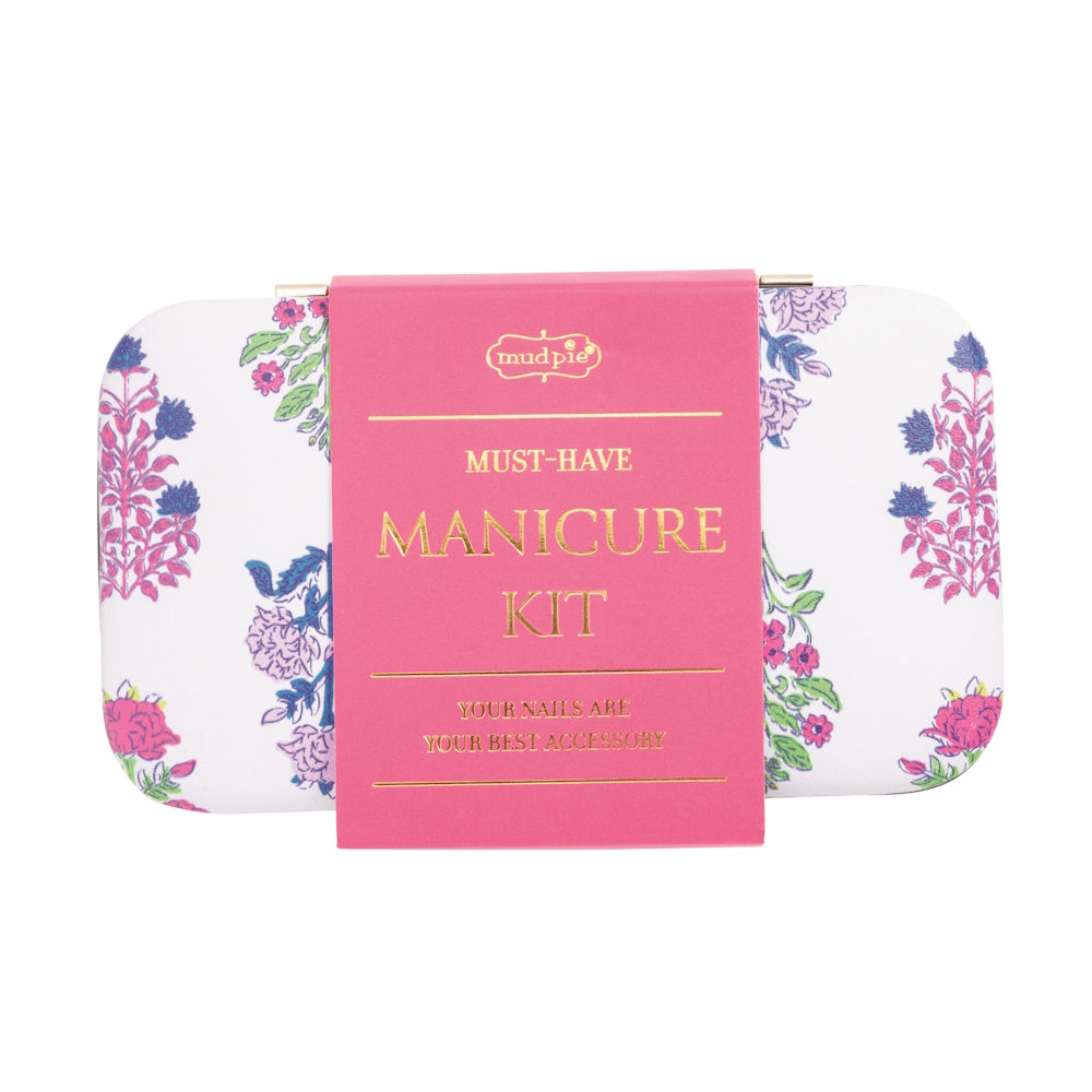 Mud Pie floral manicure kit in a white case with pink and purple flower patterns and a pink "Must-Have" gift band.