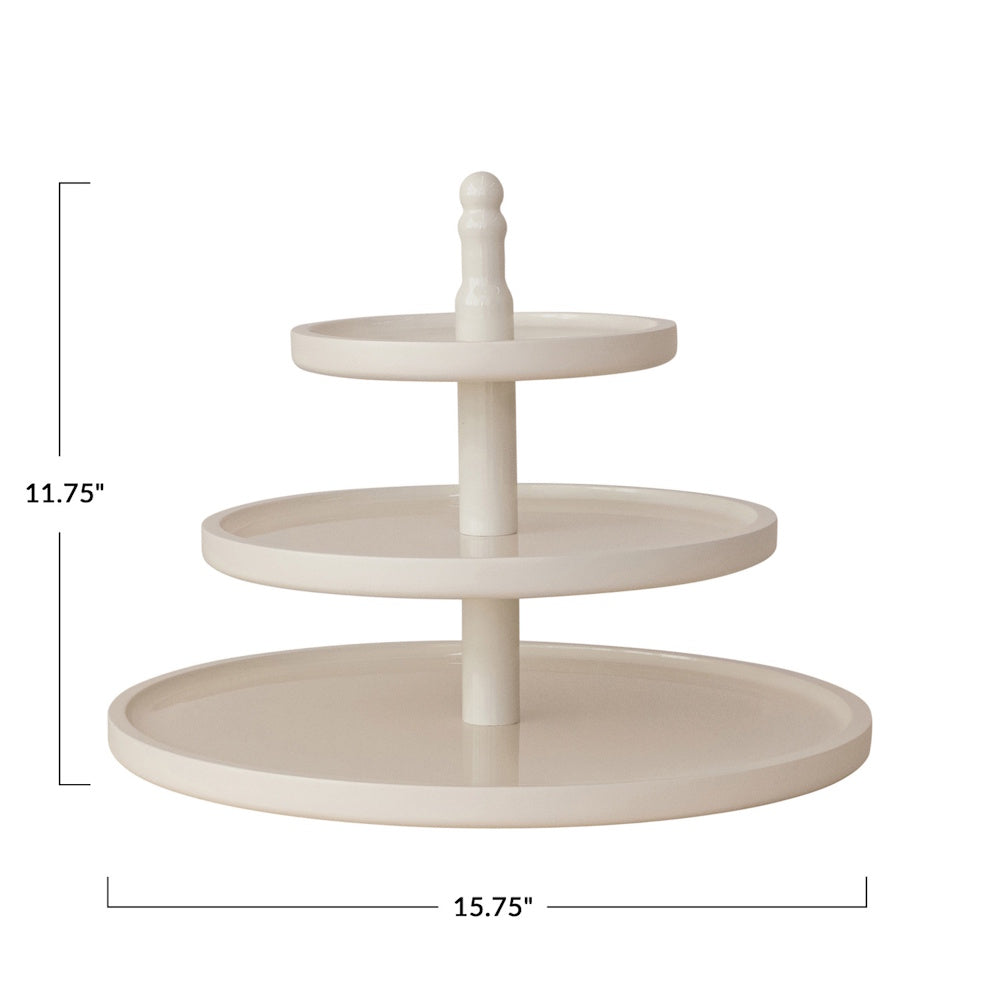A white lacquered 3-tier tray measuring 11.75 inches high by 15.75 inches wide.