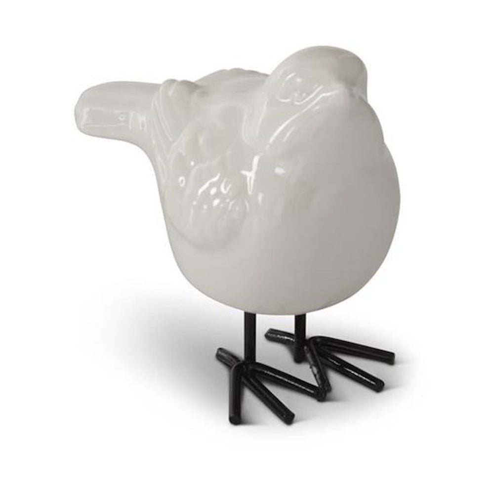 White porcelain bird figurine with black metal legs on a white background.