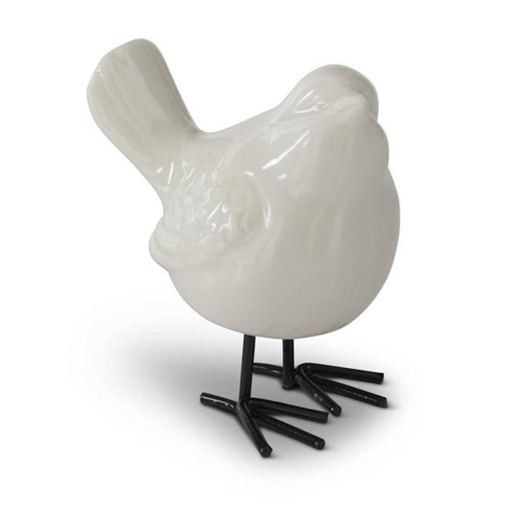 Glossy white porcelain bird figurine with black metal legs on a white background.