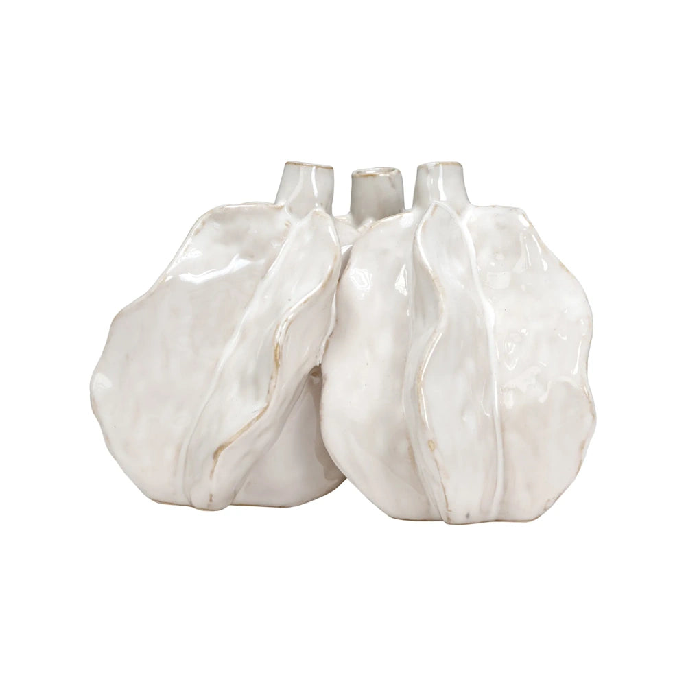 A cluster of three interconnected glossy white ceramic vases with wavy, textured organic shapes.