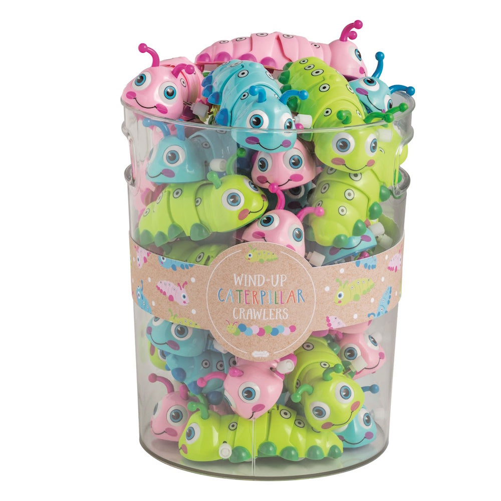 Clear jar filled with colorful wind-up caterpillar crawler toys in green, pink, and blue against a white background.