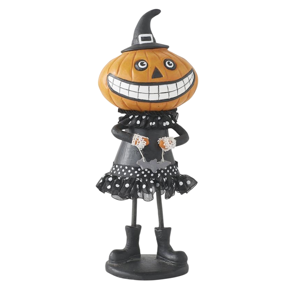 Halloween figurine featuring a pumpkin head with a wide grin, wearing a black witch hat and polka-dot dress.