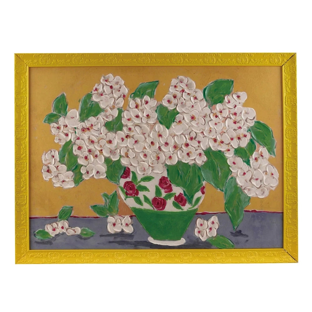 Impasto floral oil painting of white blossoms in a green patterned vase, set in an ornate yellow wood frame.