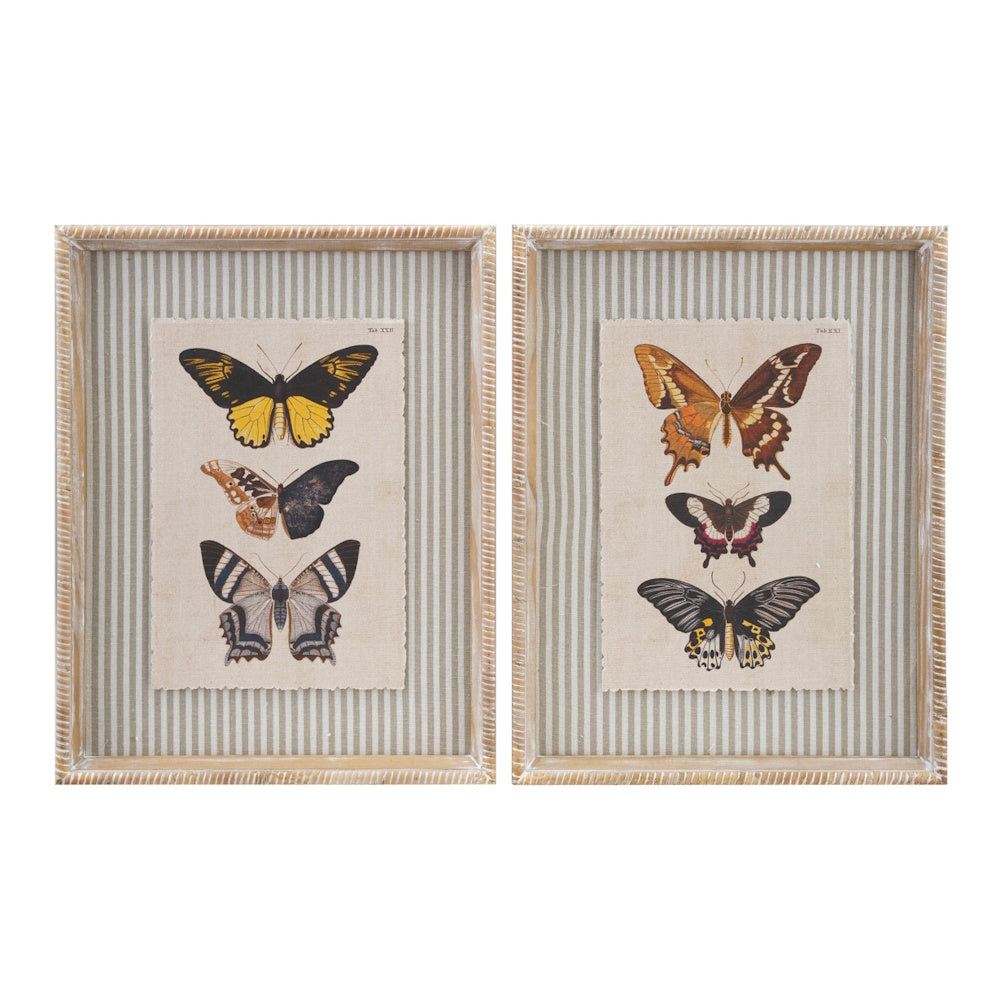 Set of two framed butterfly illustrations with striped fabric mats and rustic wood frames for vintage wall decor.