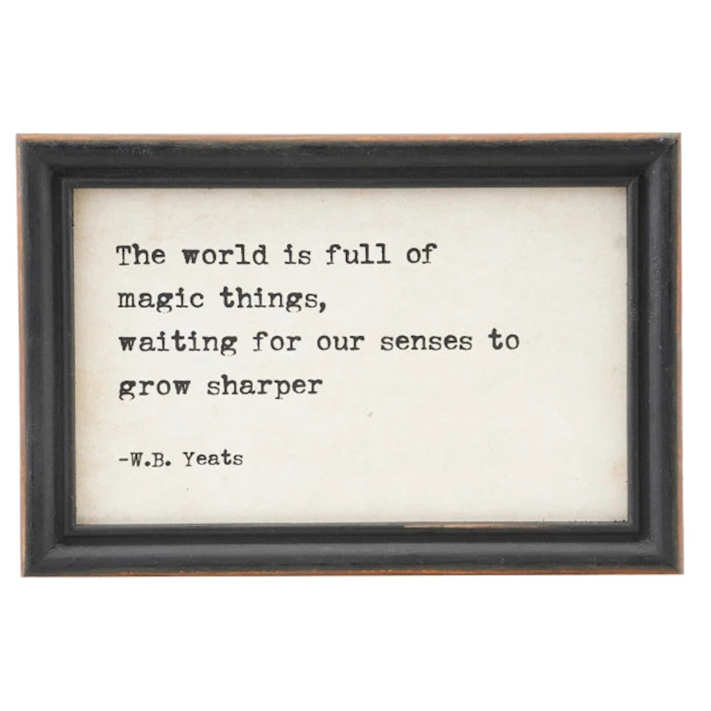 Black wood-framed wall art with a typed W.B. Yeats quote about magic things on a cream background.