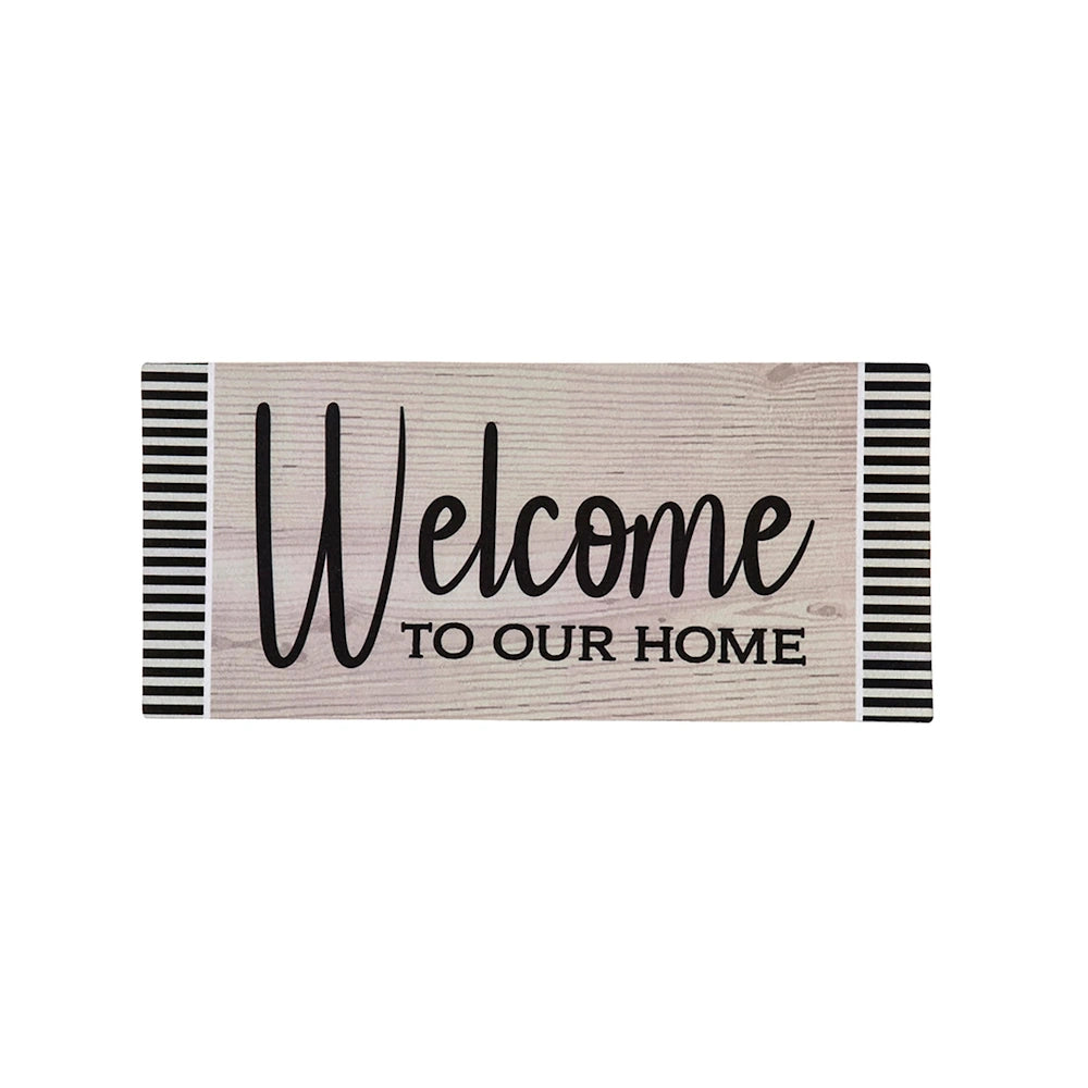 Decorative Welcome to Our Home sign with wood grain background and black striped borders for farmhouse wall decor.