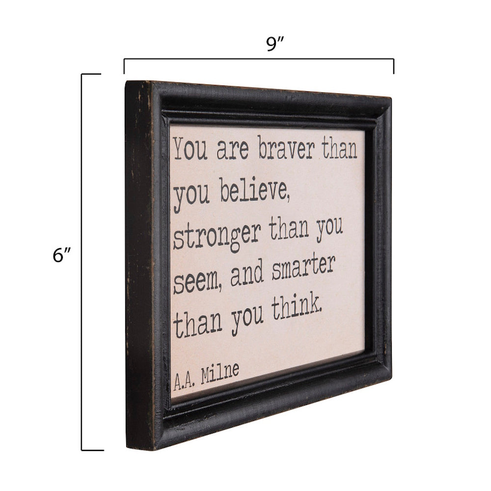 Dimensions diagram of an A.A. Milne quote wood wall sign measuring 9 inches wide by 6 inches high with a black frame.