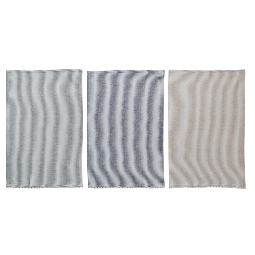 Three woven kitchen towels with subtle vertical pinstripes in light blue, dark blue, and beige side by side.